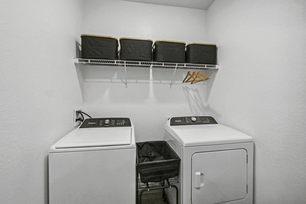 laundry room at Advenir at Mallory Lake Apartments