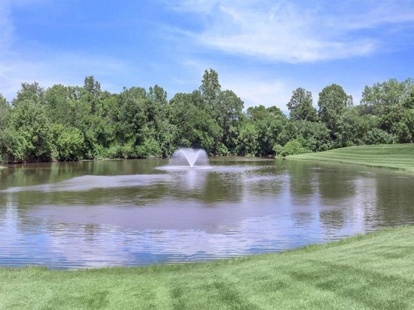 The Retreat Northwest: View of landscaped grounds with spacious, luxury apartments, ideal for relaxation and recreation