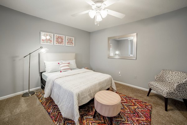 Bedroom featuring modern decor and cozy ambiance at Wylde at Eagle Creek Apartments