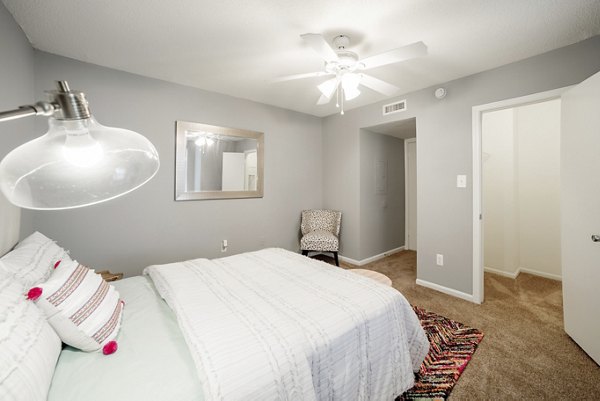 Spacious bedroom with modern decor at Wylde at Eagle Creek Apartments
