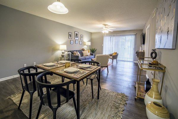 Dining area featuring sleek design and modern furnishings at Wylde at Eagle Creek Apartments
