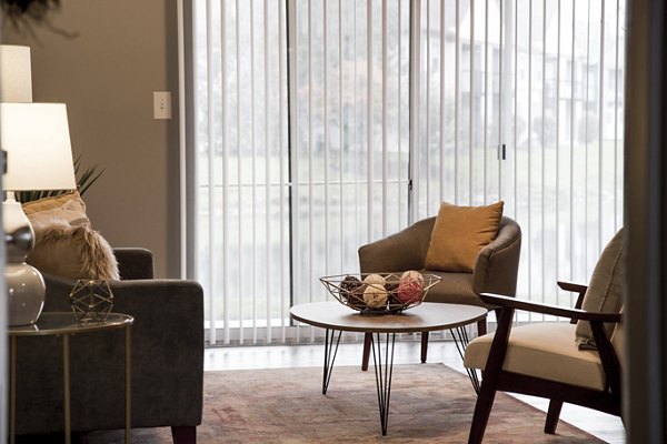 Spacious living room with modern decor at Wylde at Eagle Creek Apartments