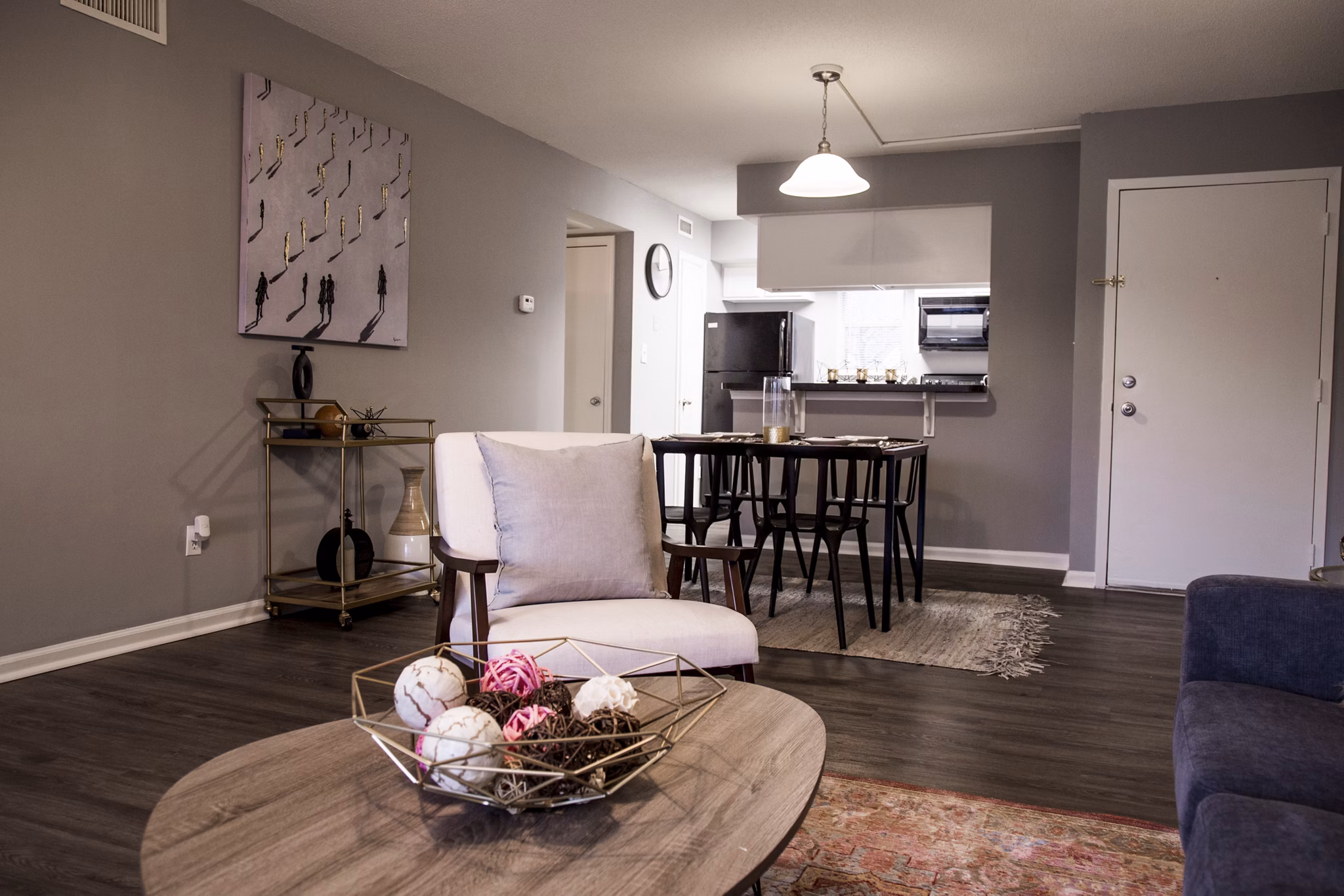 Modern living room with open floor plan at Wylde at Eagle Creek Apartments
