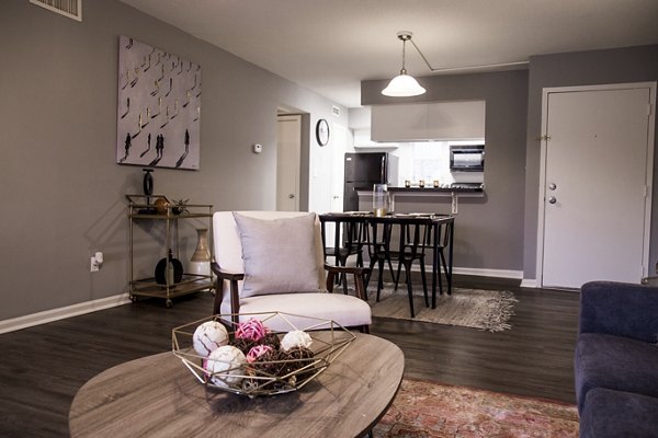 Modern living room with open floor plan at Wylde at Eagle Creek Apartments