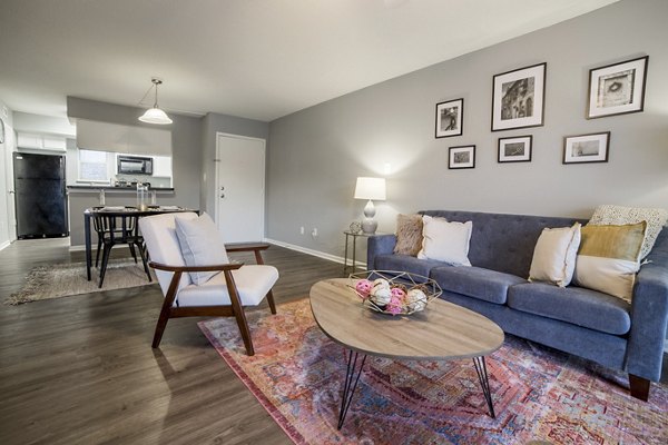 Spacious living room with modern decor at Wylde at Eagle Creek Apartments
