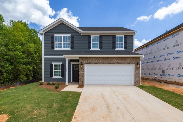 Smith Crossing Apartments: Luxurious view of modern residences in uptown neighborhood