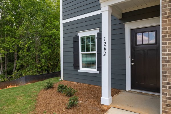 Smith Crossing Apartments: Elegant view of luxury apartments in a serene suburban setting