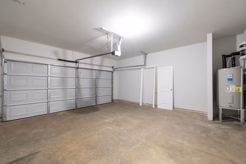 Enclosed parking garage at Smith Crossing Apartments offering secure vehicle storage for residents