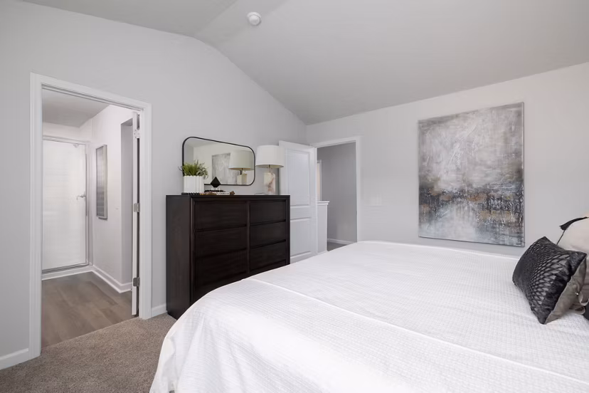Modern bedroom featuring elegant decor and ample natural light at Smith Crossing Apartments in luxury accommodation style
