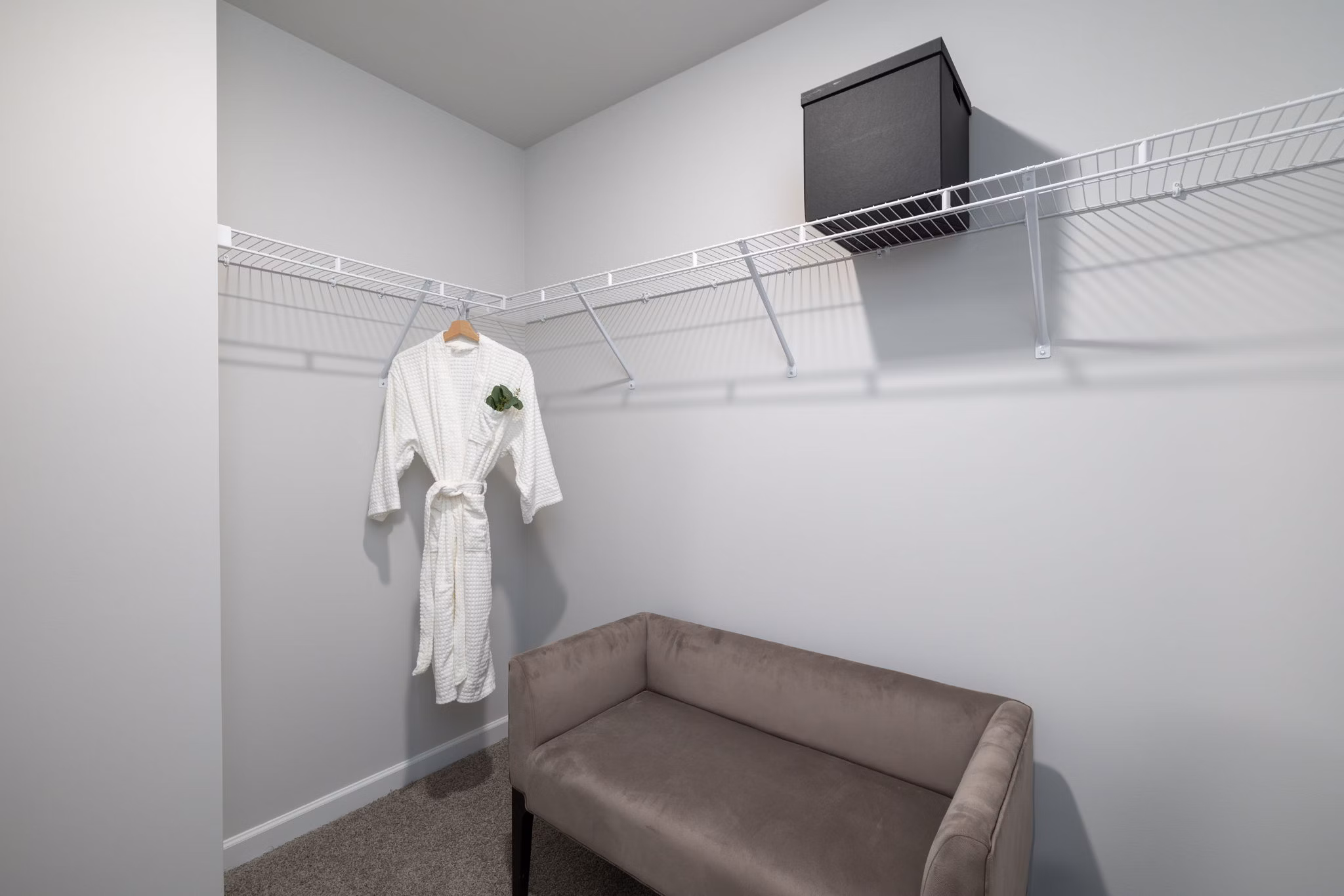Walk-in closet with ample storage space at Smith Crossing Apartments