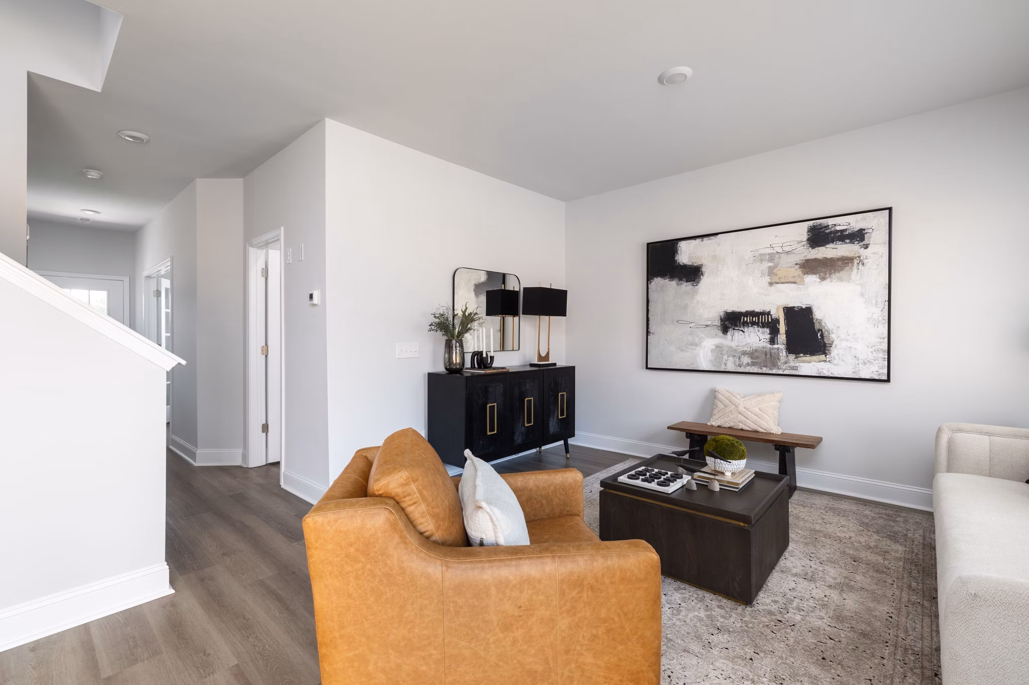 Spacious living room with contemporary design elements at Spire at Smith Crossing Apartments