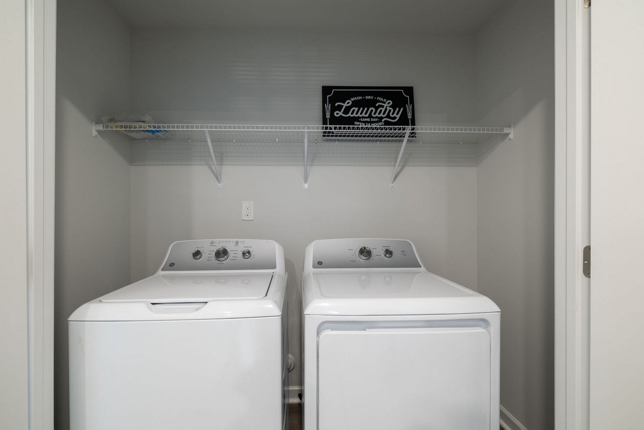 Laundry room at Spire At Smith Crossing