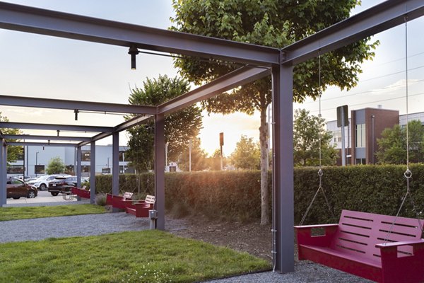 Station 40: Luxury apartment community courtyard featuring lush gardens in San Francisco