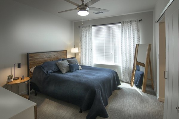 bedroom at Cycle Apartments