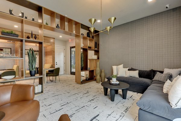 Elegant clubhouse at Lenox Grandview Apartments featuring modern interiors and comfortable seating areas