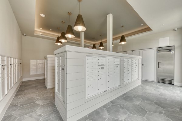 Mailroom at Lenox Grandview Apartments with secure package lockers and sorting system