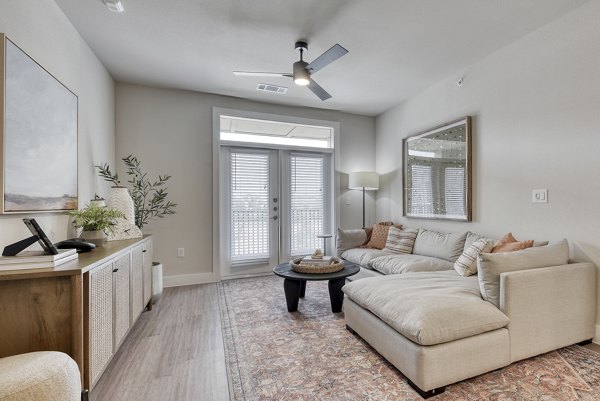 Spacious living room with modern decor in Lenox Grandview Apartments luxury rentals