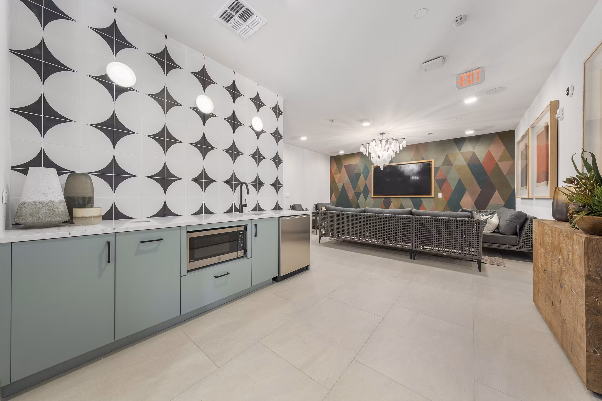 Clubhouse featuring a modern design with communal seating and entertainment options at Vero Tempe Apartments luxury residences