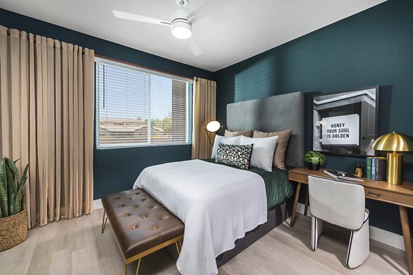 Cozy bedroom with elegant decor at Marlowe Centennial Hills Apartments