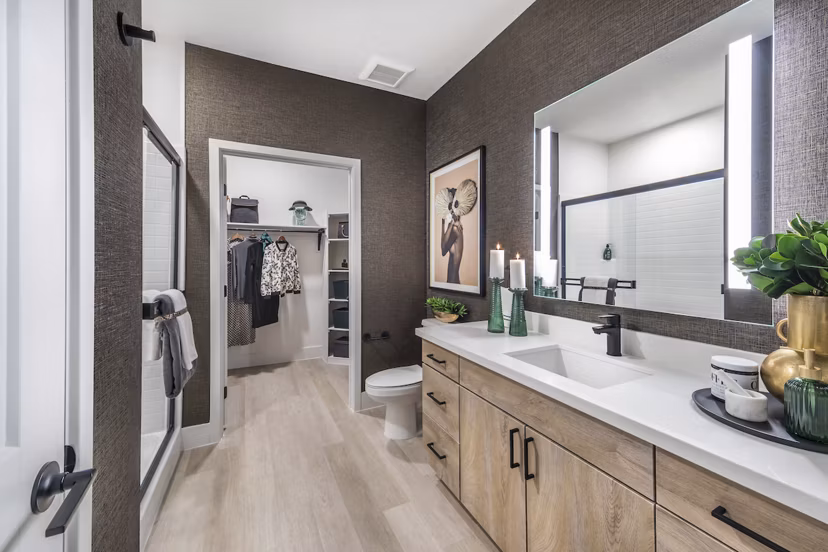 Modern kitchen with stainless steel appliances and granite countertops in Marlowe Centennial Hills Apartments