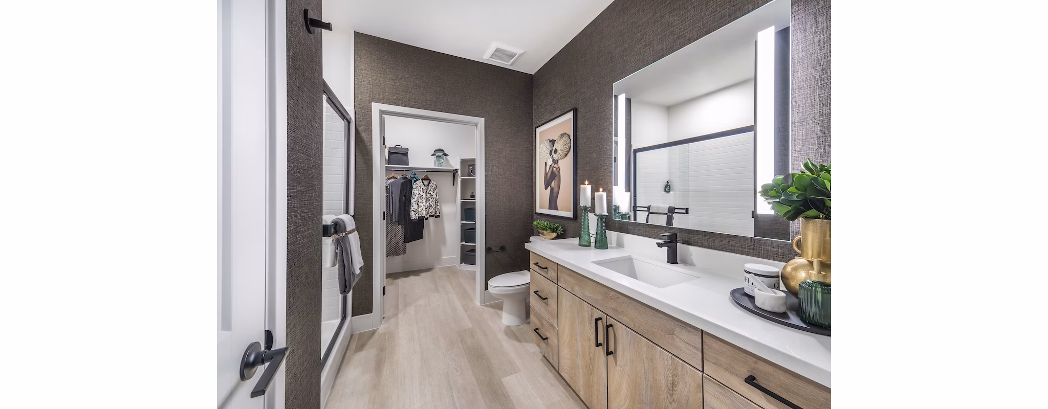 Modern kitchen with stainless steel appliances and granite countertops in Marlowe Centennial Hills Apartments