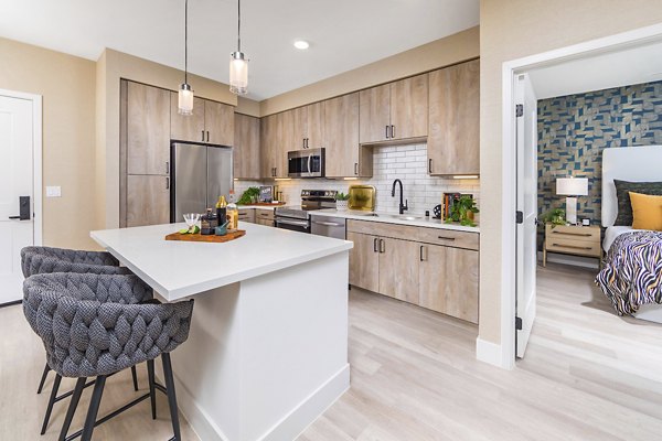 Modern kitchen with stainless steel appliances at Marlowe Centennial Hills Apartments