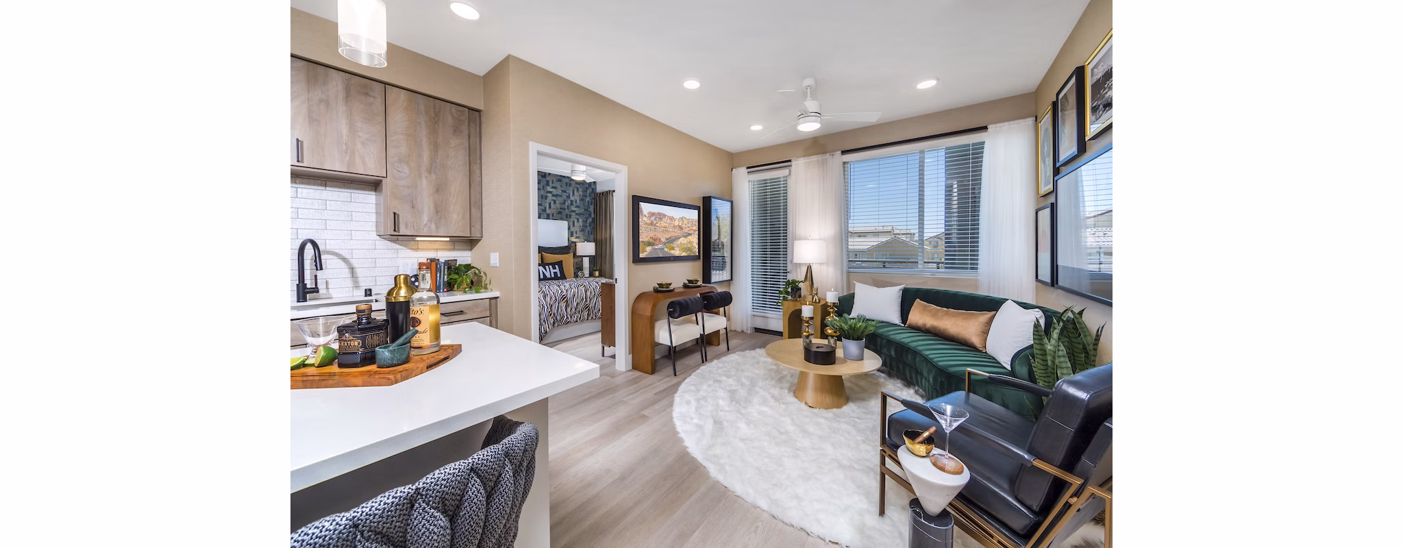 Spacious living room with modern decor and large windows in Marlowe Centennial Hills Apartments