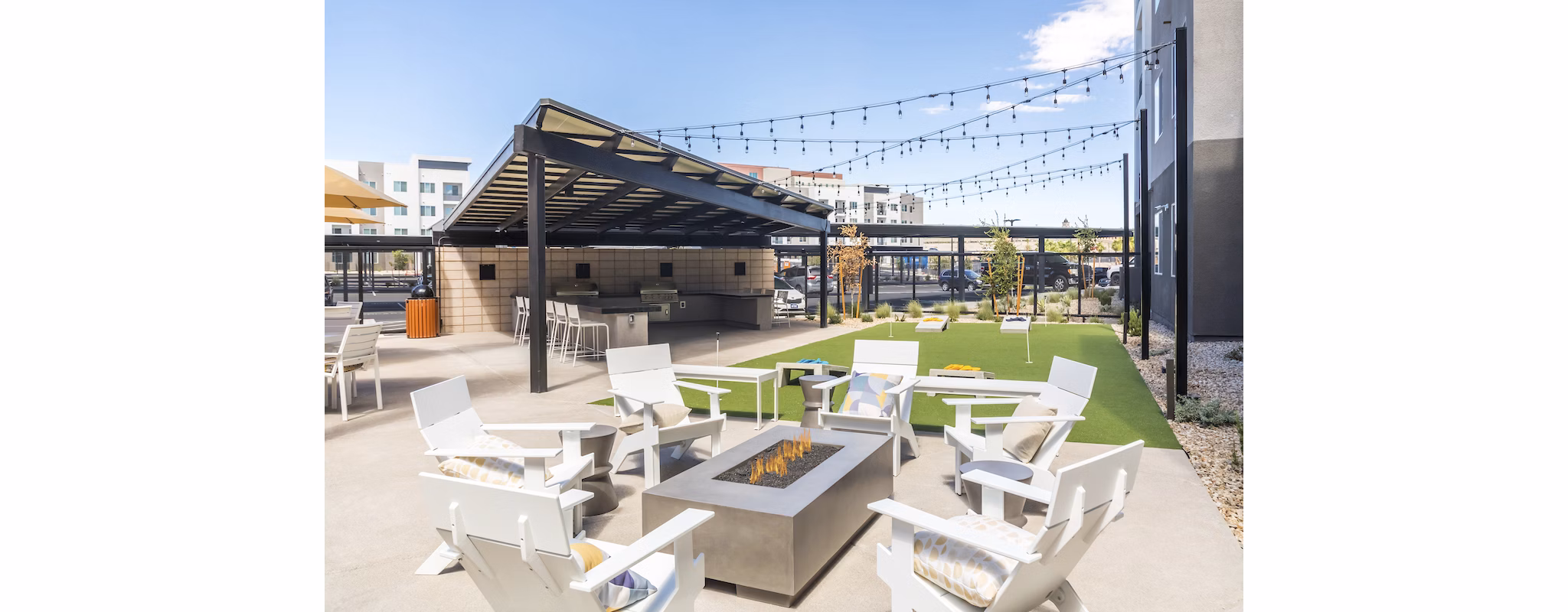 Cozy outdoor seating with fire pit at Marlowe Centennial Hills Apartments