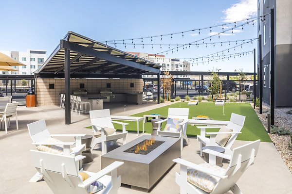 Cozy outdoor seating with fire pit at Marlowe Centennial Hills Apartments