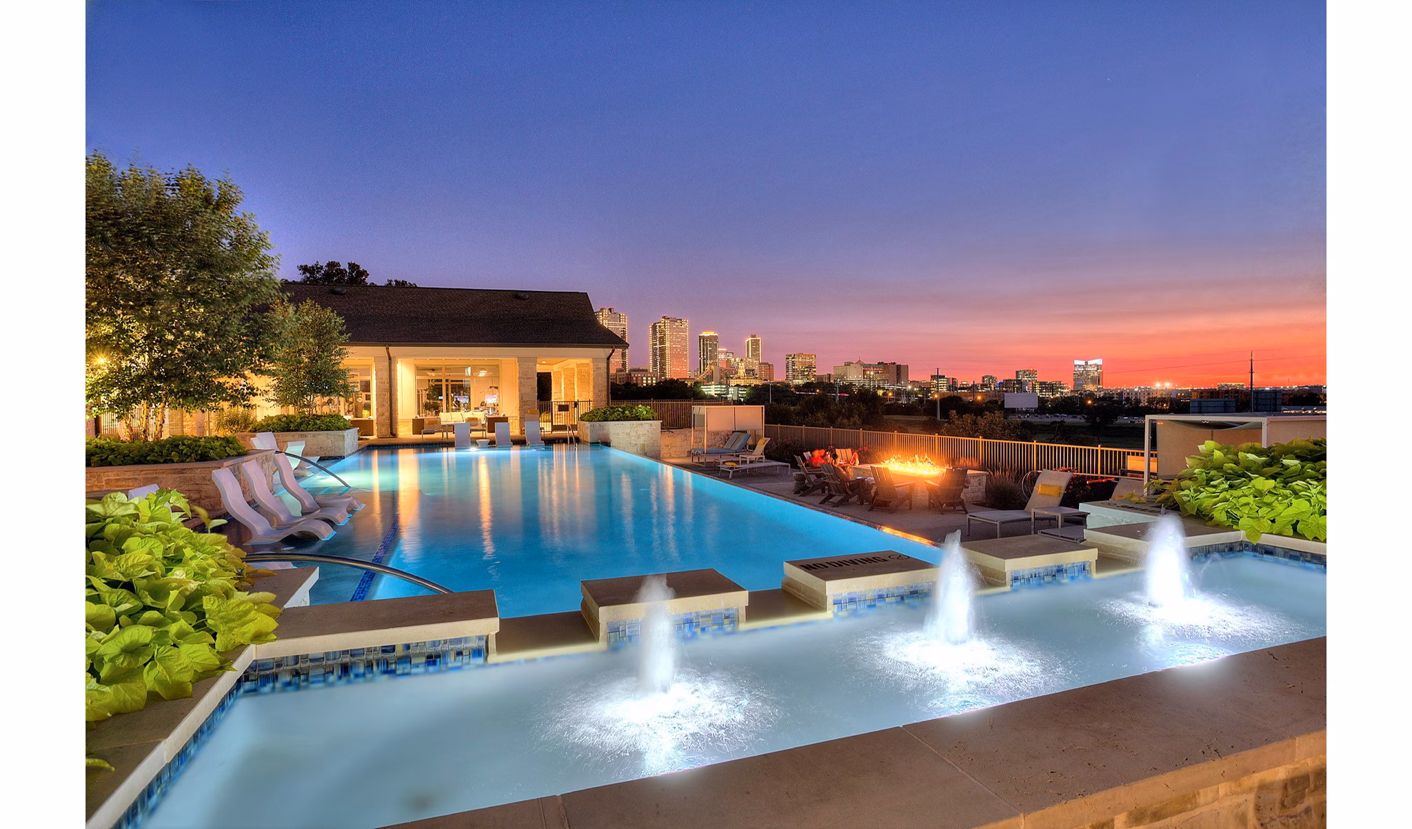 Inviting pool area at The Kelley at Samuels Avenue Apartments, perfect for relaxation and leisure outdoors