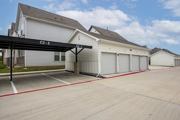 Covered parking garage at Mission at Johnson Creek Apartments providing secure and convenient options for residents
