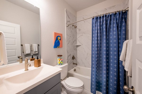 Modern bathroom with sleek fixtures at Mission at Johnson Creek Apartments