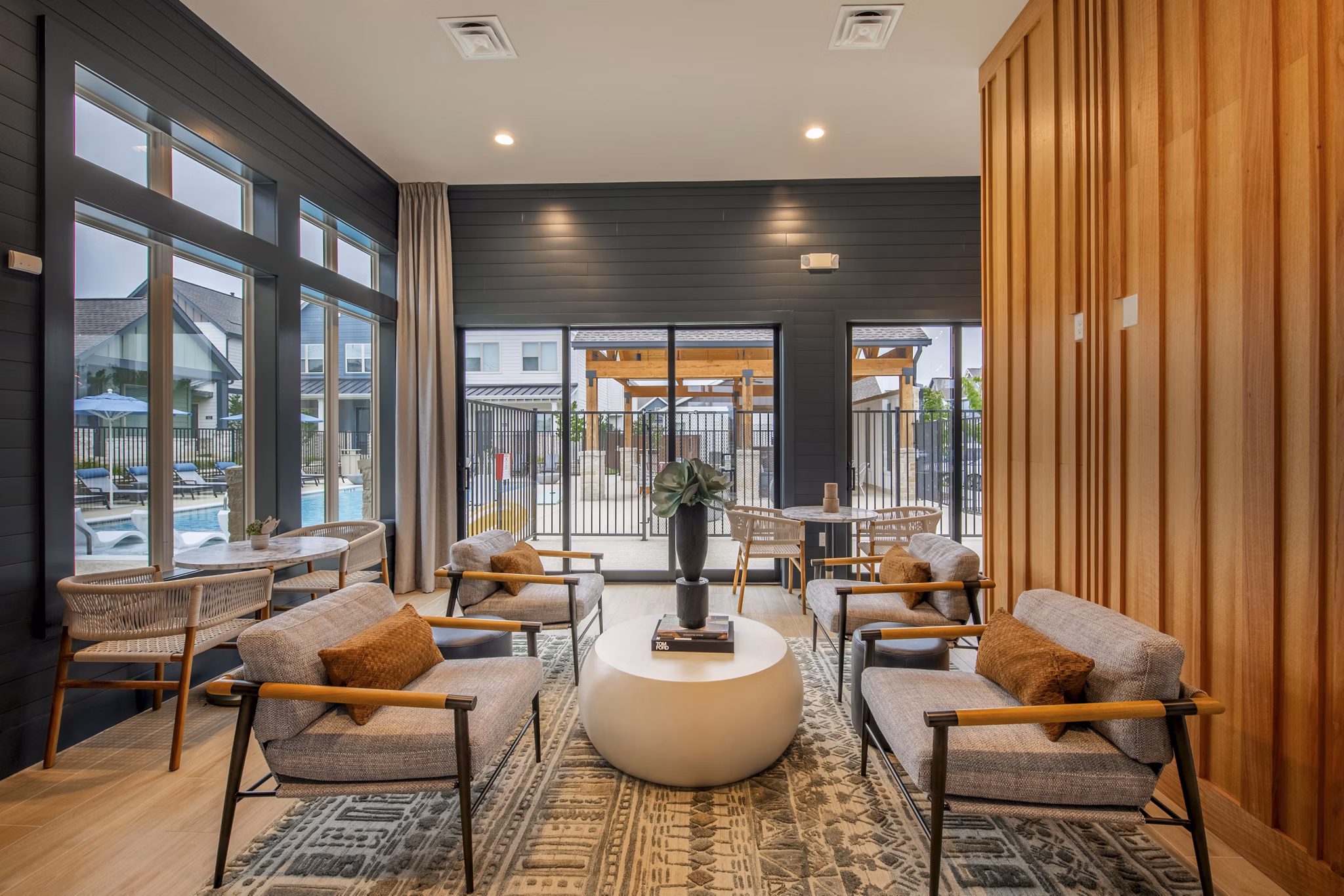 Clubhouse with modern lounge spaces at Mission at Johnson Creek Apartments, luxury living in a vibrant community
