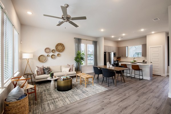 Modern kitchen with stainless steel appliances in Mission at Johnson Creek Apartments