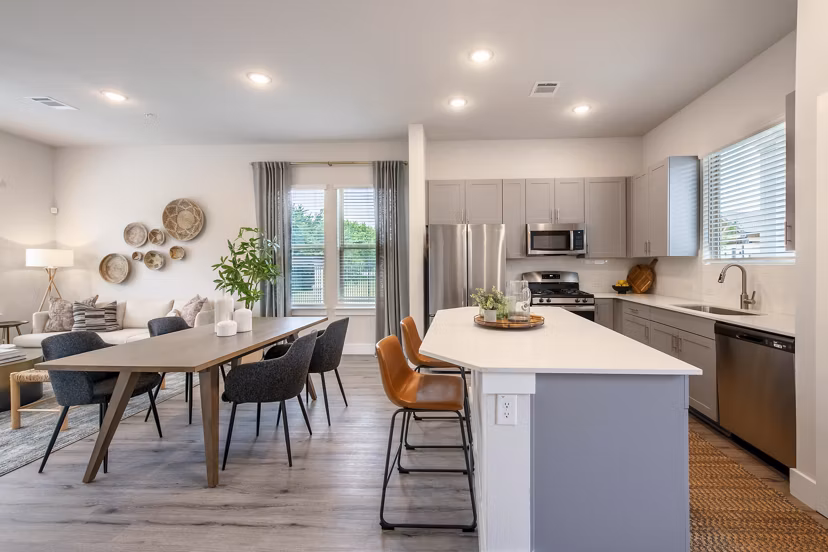 Modern kitchen featuring stainless steel appliances at Mission at Johnson Creek Apartments