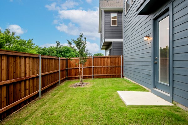 Patio with cozy seating at Mission at Johnson Creek luxury apartments