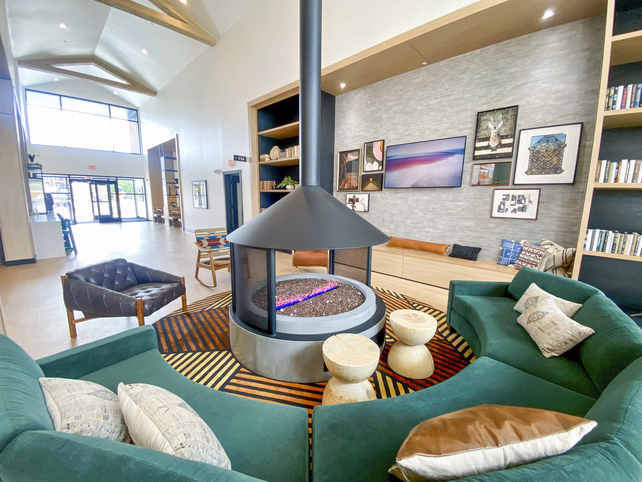 Lounge area with modern seating and elegant decor in the clubhouse at Lariat Apartments