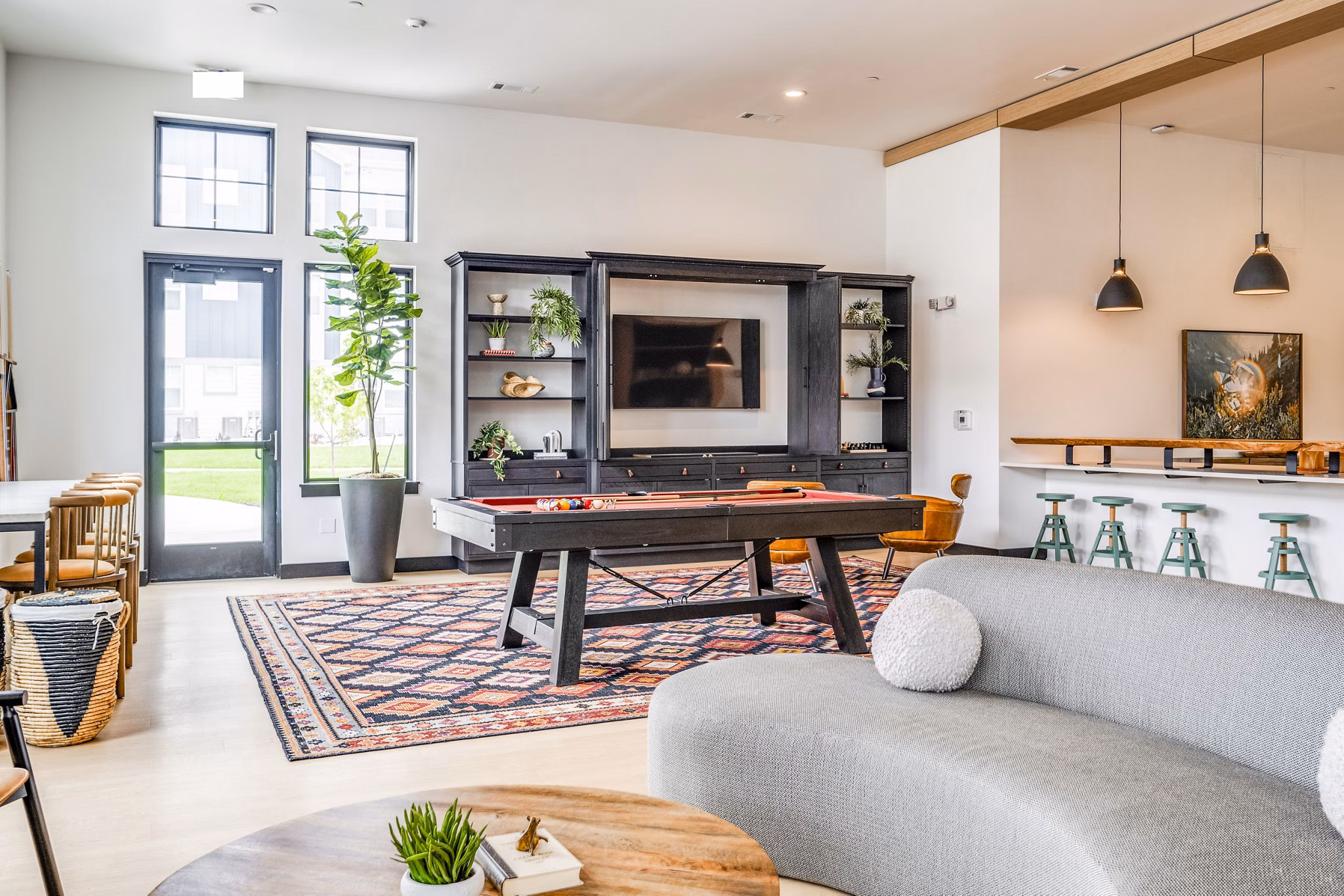 Spacious clubhouse game room featuring modern design at Lariat Apartments in Phoenix