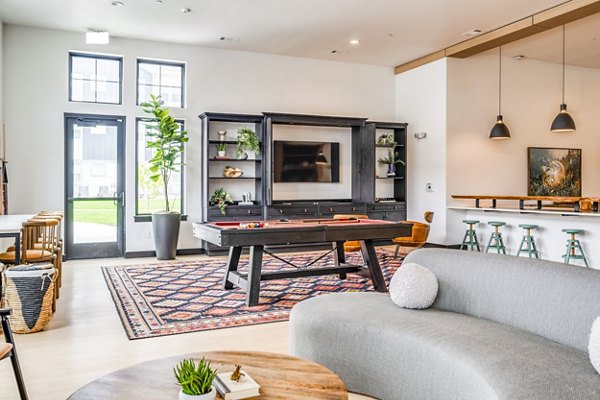 Spacious clubhouse game room featuring modern design at Lariat Apartments in Phoenix