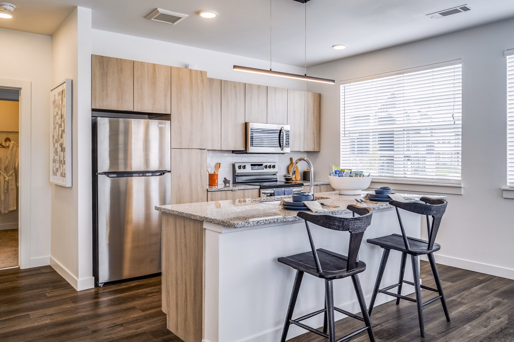 Modern kitchen with stainless steel appliances at Lariat Apartments, part of Greystar's luxury living collection