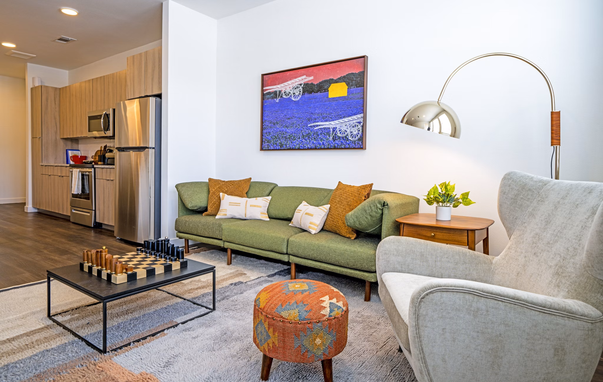 Spacious living room with modern furnishings in Lariat Apartments, a luxury property by Greystar