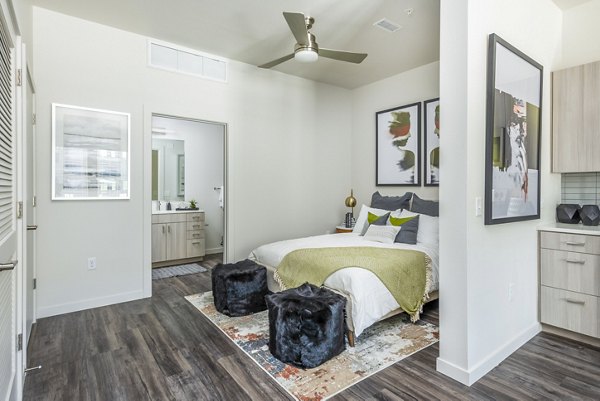 Bedroom with contemporary decor at Railway Flats Apartments offering luxury living
