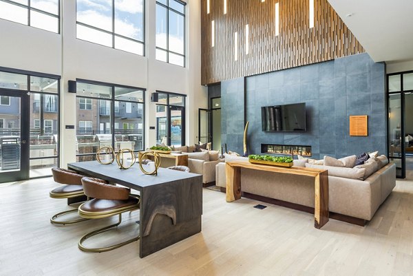 Clubhouse interior with cozy seating and modern dÃ©cor at Railway Flats Apartments