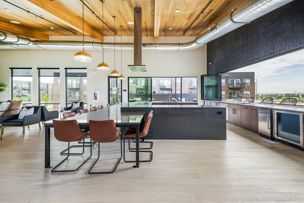 Clubhouse featuring modern furnishings and social spaces at Railway Flats Apartments
