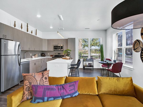 Spacious living room with modern decor at Railway Flats Apartments, offering luxury living spaces near city center amenities
