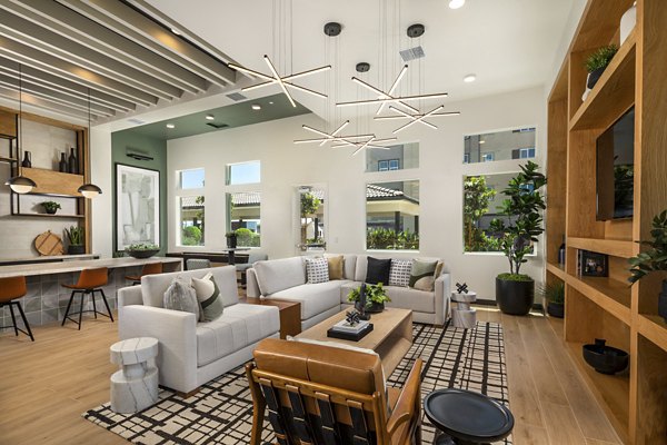 Modern clubhouse with stylish seating and open spaces at Delhaven Pointe Apartments