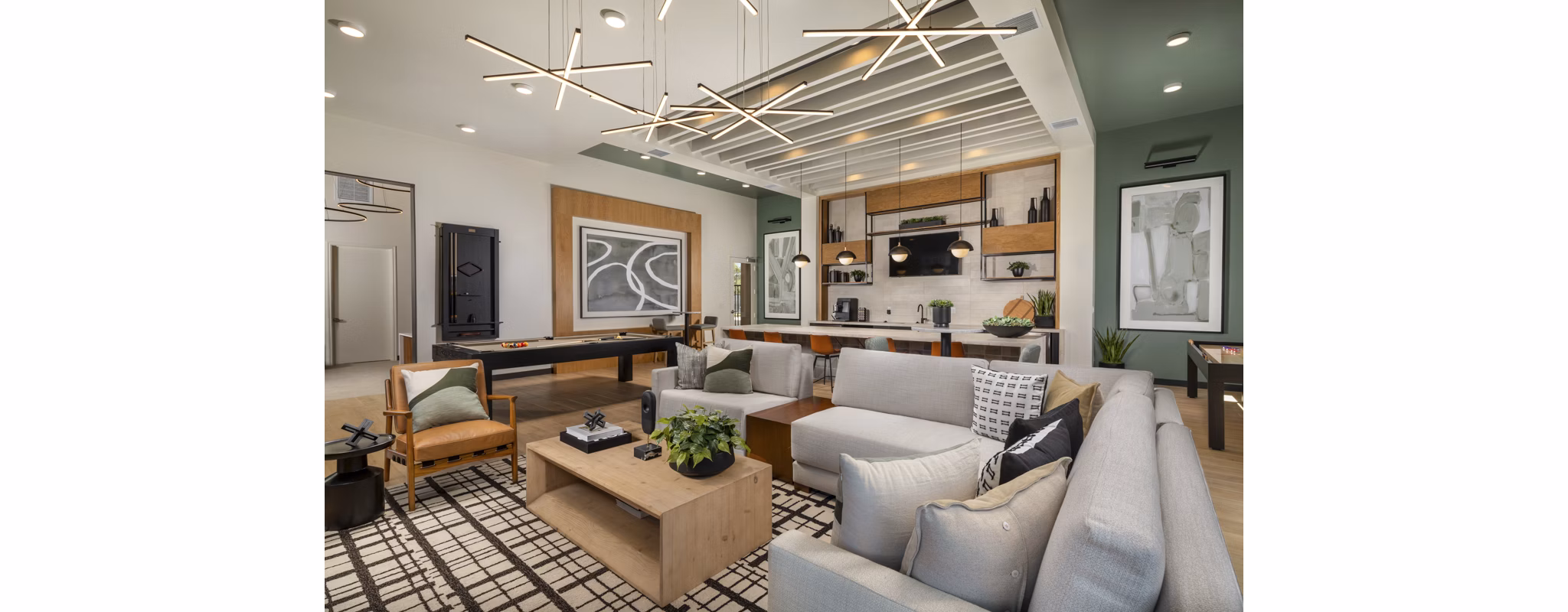 Delhaven Pointe Apartments: Modern clubhouse featuring a cozy lounge and meeting spaces