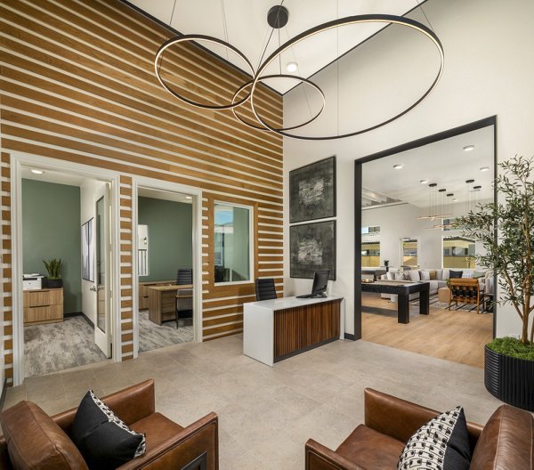 Clubhouse with modern furnishings and cozy seating at Delhaven Pointe Apartments