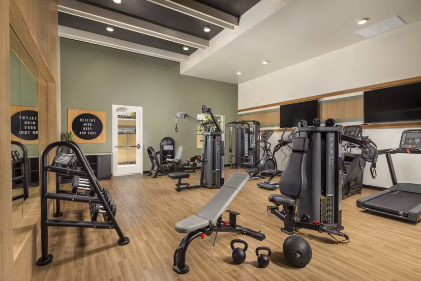 State-of-the-art fitness center with modern equipment at Delhaven Pointe Apartments