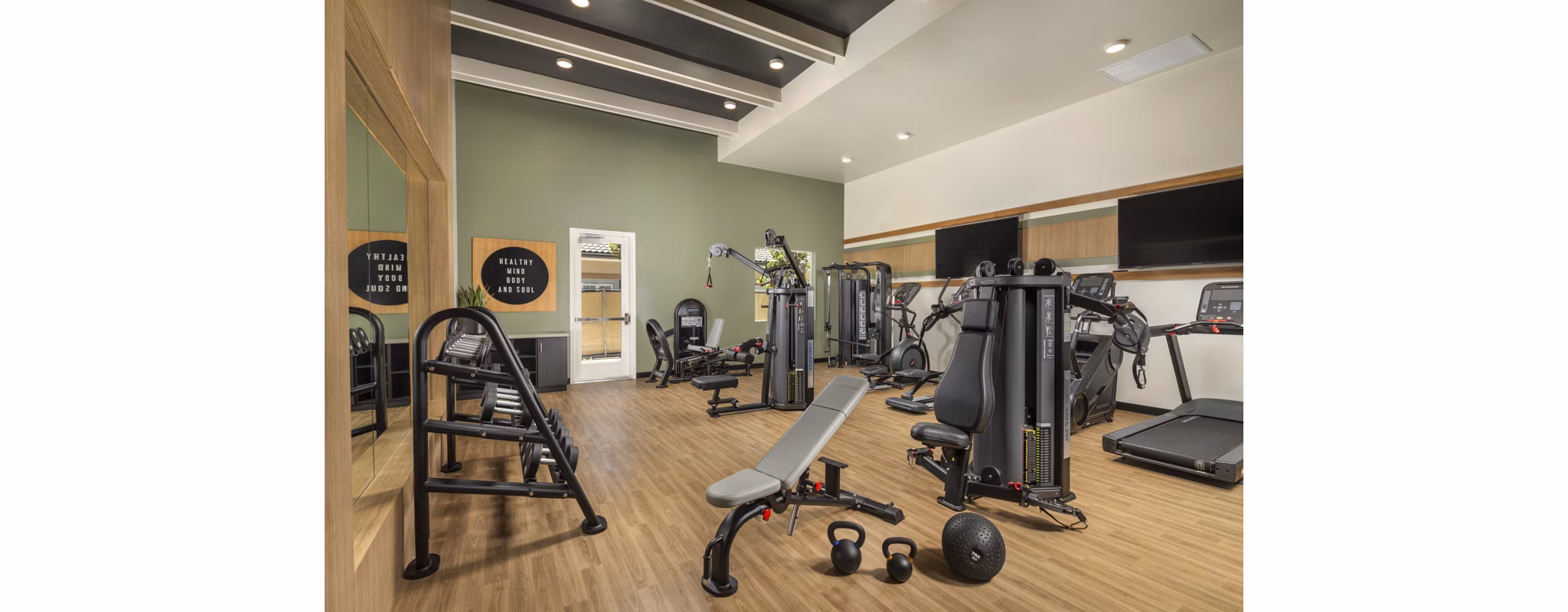 State-of-the-art fitness center with modern equipment at Delhaven Pointe Apartments